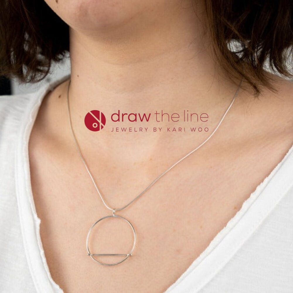 Kari Woo 'Draw the Line' | Sterling Silver Necklace | 'Kinetic Hoop Pendant'
